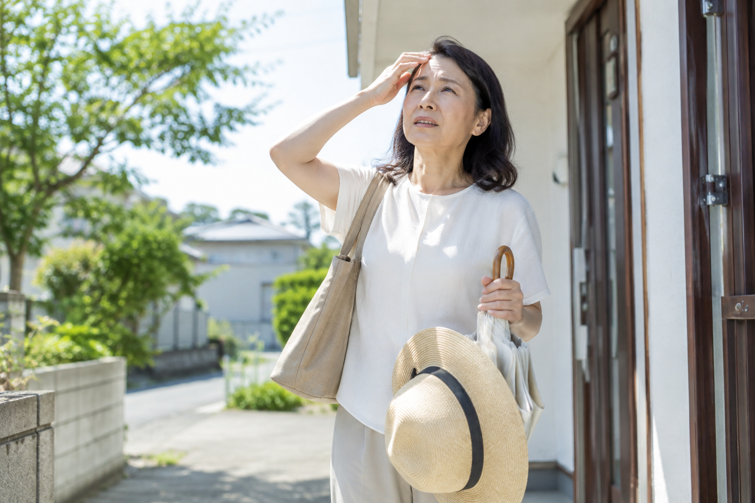 暑い日に外出や歩くことをためらっている女性