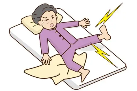 足がつって眠れない女性のイラストです。
